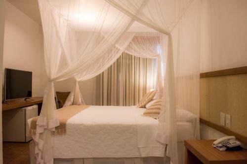 普拉亚萨拉纳酒店 客房内的一张或多张床位