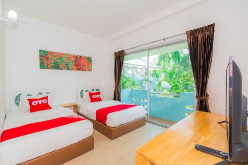 OYO 614 Koh Lak Resort客房内的一张或多张床位