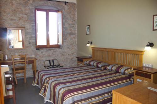 穆拉耶塔酒店客房内的一张或多张床位