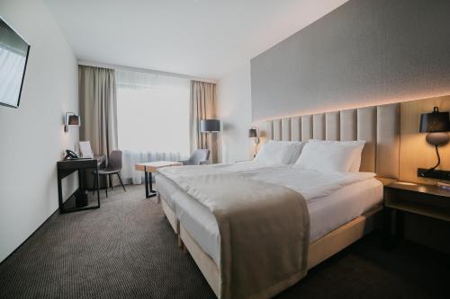 B&B HOTEL Warsaw East客房内的一张或多张床位