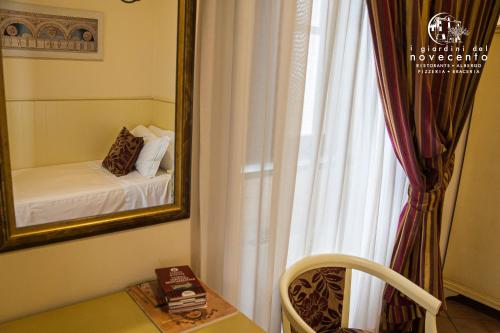 giardini del Novecento客房内的一张或多张床位