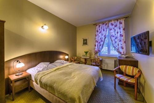 Hotel BERLINER客房内的一张或多张床位