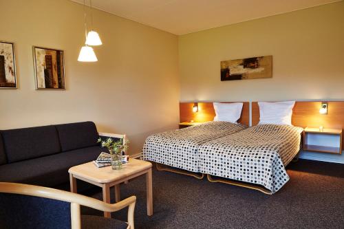 Hotel Hedemarken客房内的一张或多张床位