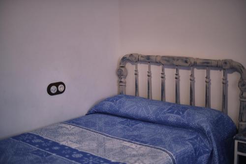 Casa rural fuentelgato客房内的一张或多张床位