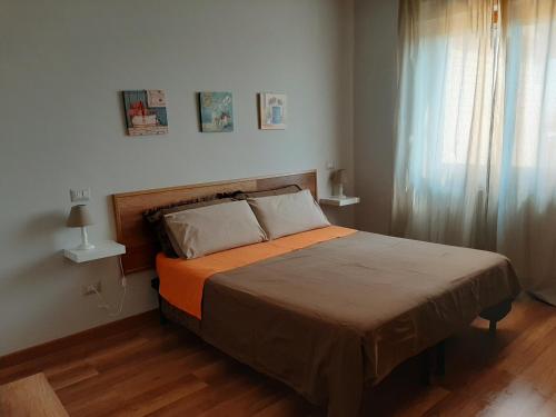 B&B Apartament Umbria6客房内的一张或多张床位