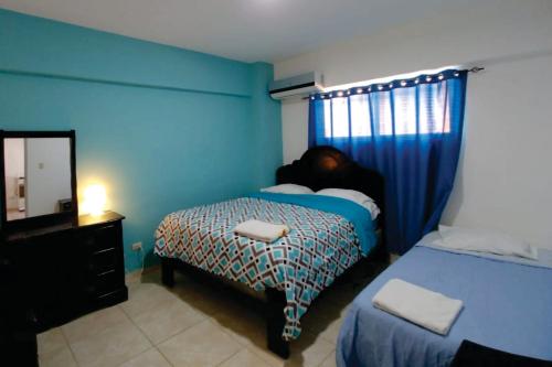 Hostal Magisterial Santo Domingo客房内的一张或多张床位