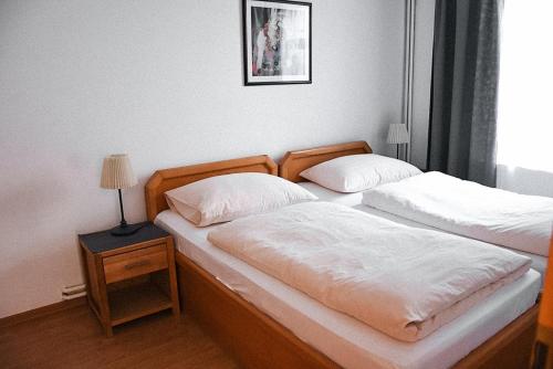 吉诺尼斯别墅旅馆客房内的一张或多张床位