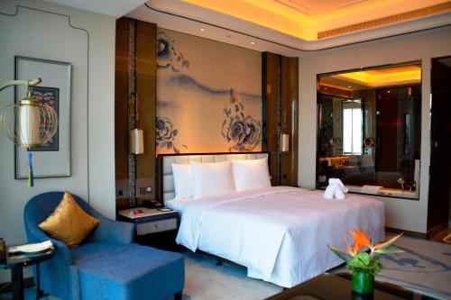 昆明富力万达文华酒店客房内的一张或多张床位