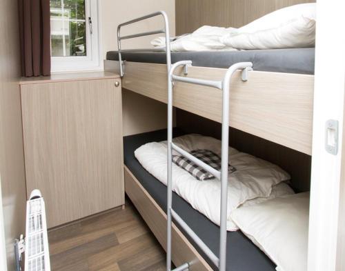 卑尔根假日公寓客房内的一张或多张床位