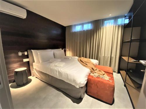 Korpa Deli Rooms SPA客房内的一张或多张床位