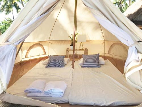 Lazy Beach Camping客房内的一张或多张床位