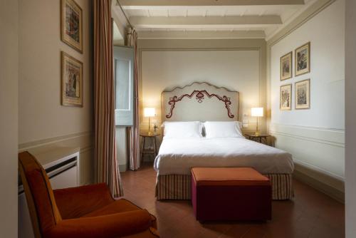 Torre a Cona Wine Estate客房内的一张或多张床位