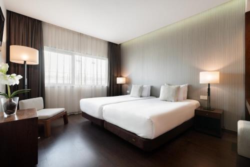 维戈欧洲之星海洋酒店客房内的一张或多张床位