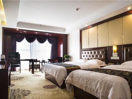 格林豪泰安徽省合肥市高新区动漫产业园商务酒店客房内的一张或多张床位