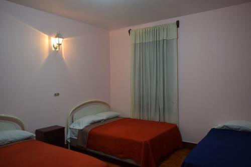 Hotel Posada del Centro客房内的一张或多张床位