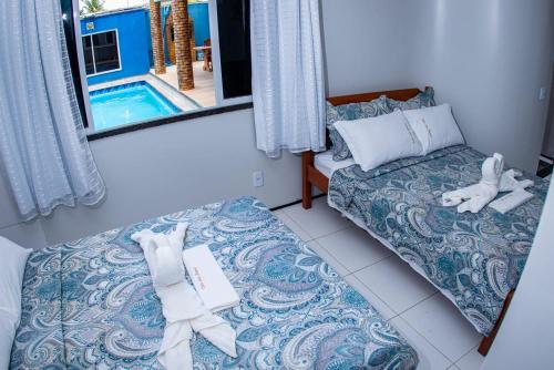 Hotel Vila das Dunas Cumbuco客房内的一张或多张床位