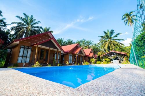 Cinta Abadi Resort内部或周边的泳池