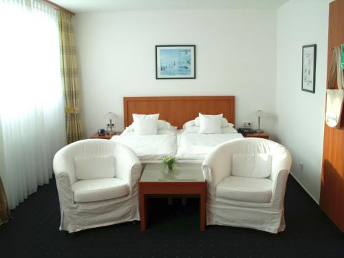 考贝辛酒店客房内的一张或多张床位