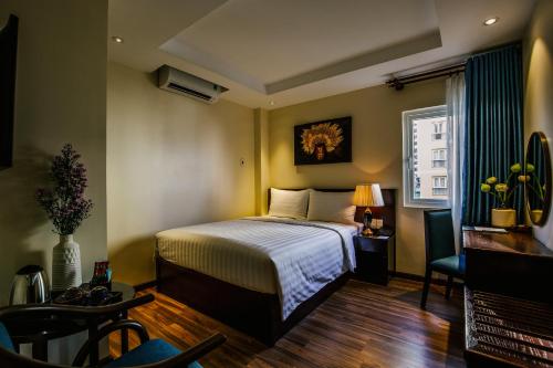 Roseland Sweet Hotel & Spa客房内的一张或多张床位