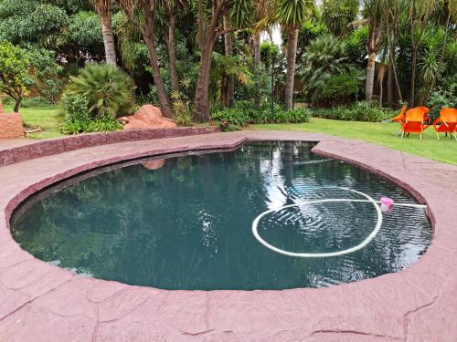 Casa De Jardim Guesthouse内部或周边的泳池