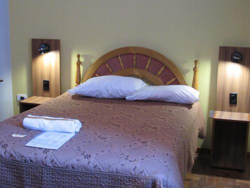 Hotel Sueños Dorados客房内的一张或多张床位