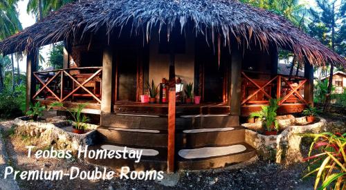 莫阿尔博阿Allba's Homestay的一个带草屋顶的小小屋