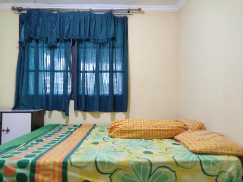 CONDOMINIUM LIPPO CARITA, Lantai Dasar - OFFICIAL客房内的一张或多张床位