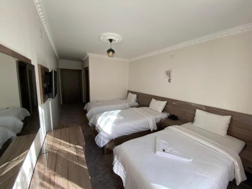 Toprak Hotel客房内的一张或多张床位