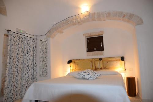 Trulli don Pietro客房内的一张或多张床位