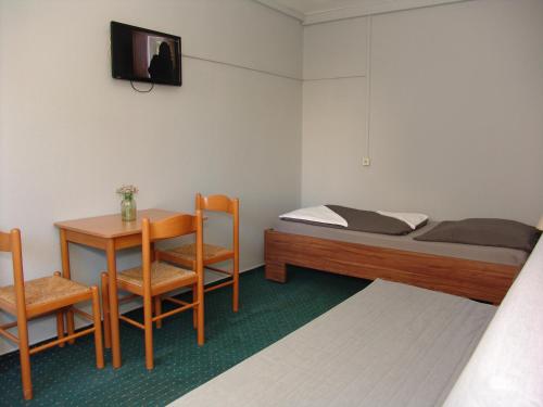 City Hotel Ansbach am KaDeWe客房内的一张或多张床位