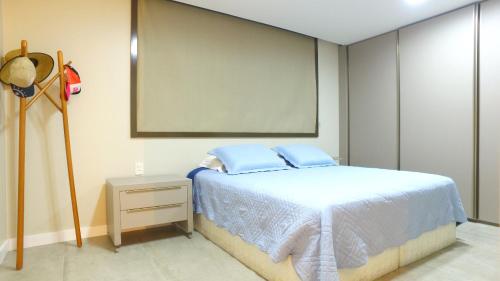 Barra Bali Apartamento 06 - Paraíso à Beira Mar客房内的一张或多张床位