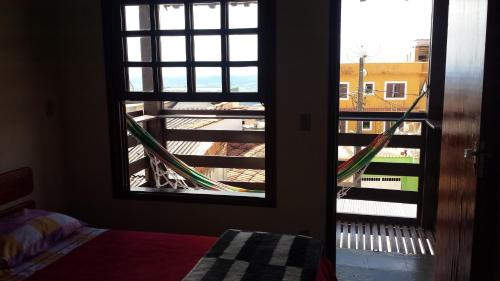 圣托梅-达斯莱特拉斯朴舍德奇科特夸拉旅馆的客房设有窗户,享有建筑的景致。