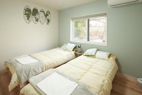 Compass Karuizawa客房内的一张或多张床位