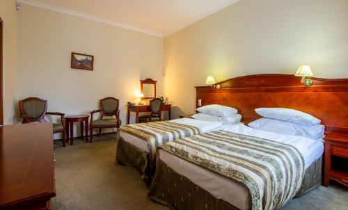 乔瓦尼贾科莫酒店客房内的一张或多张床位