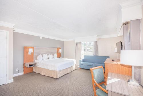 Casa Bella Inn & Suites Extended Stay客房内的一张或多张床位