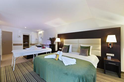 沙勒罗伊机场凡德瓦克酒店客房内的一张或多张床位