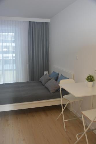 Apartament Royal Place II Jurowiecka 17客房内的一张或多张床位