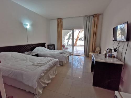 Azraq Rest House客房内的一张或多张床位