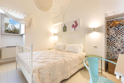 I Colmi Trulli Suites by BarbarHouse客房内的一张或多张床位
