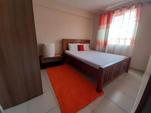Jayson Furnished Apartment, Nairobi客房内的一张或多张床位
