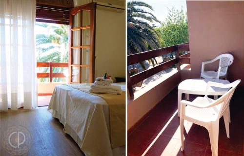 维拉卡洛斯帕兹Casa Piedra Hotel的客房设有桌子、椅子和窗户。