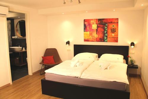 Moderne stilvolle Wohnung im Herzen Münchens客房内的一张或多张床位