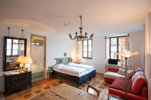 Boutique-Hotel Guesthouse Le Locle客房内的一张或多张床位