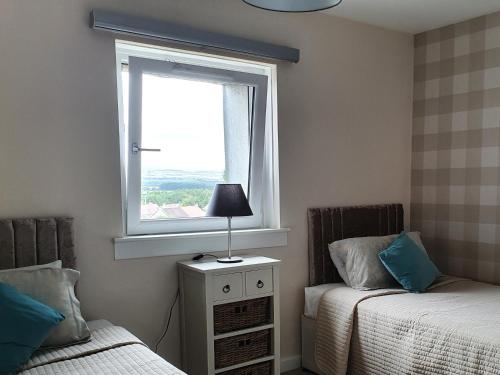 Gullane View Apartment客房内的一张或多张床位