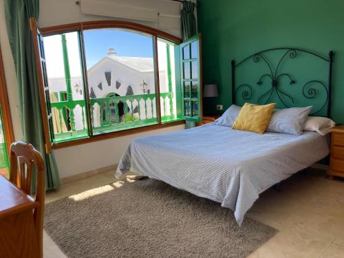 HOTEL-FINCA Rural José Manuel 28pax客房内的一张或多张床位