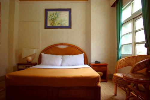 统一旅社客房内的一张或多张床位