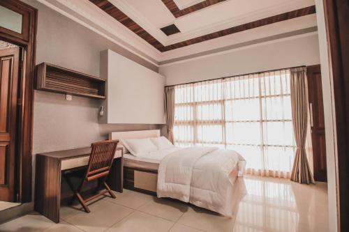 Stay Inn Pasteur Bandung, Husein Sastranegara Airport客房内的一张或多张床位