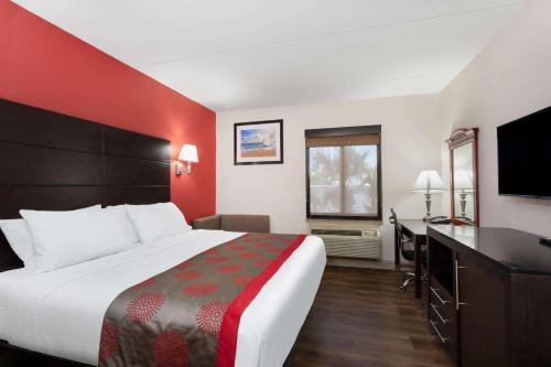 华美达温德姆巴拿马城酒店客房内的一张或多张床位