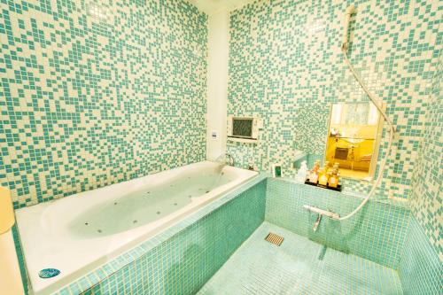 长崎教堂椰子度假酒店 的一间浴室