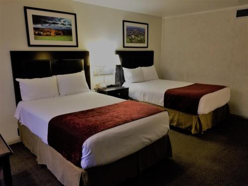华盛顿华美达酒店 客房内的一张或多张床位
